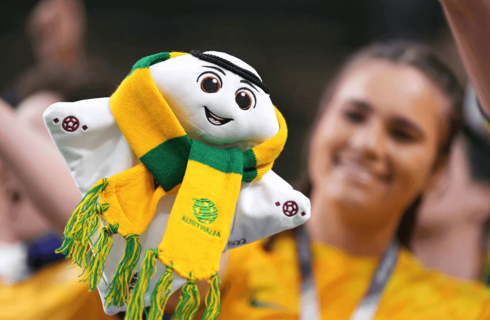 Credit: IMAGO / Xinhua. A fan of Australia plays with the official mascot La eeb before the Group D match between Australia and Denmark at the 2022 FIFA World Cup