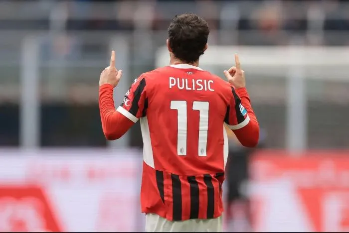 Christian Pulisic of AC Milan celebrates after scoring a penalty