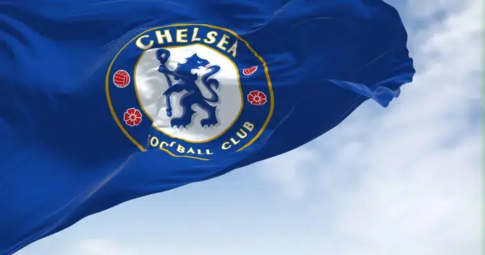 The flag of Chelsea Football Club waving in the wind on a clear day