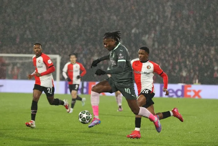 AC Milan's Rafael Leao (front) competes during the UEFA Champions League football match between Feyenoord and AC Milan