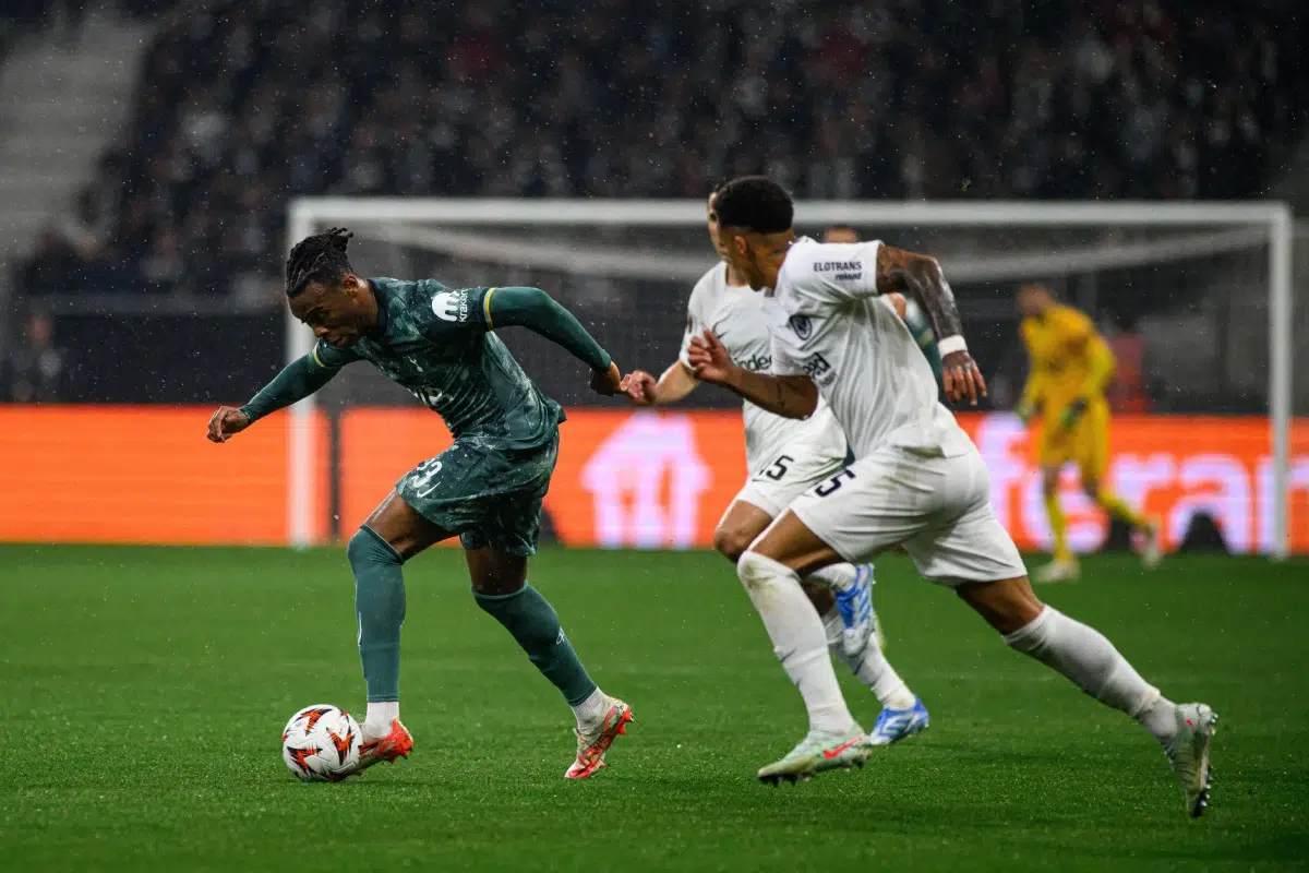 Mathys Tel breaks away from Tuta during Frankfurt vs Tottenham Europa Cup game.
