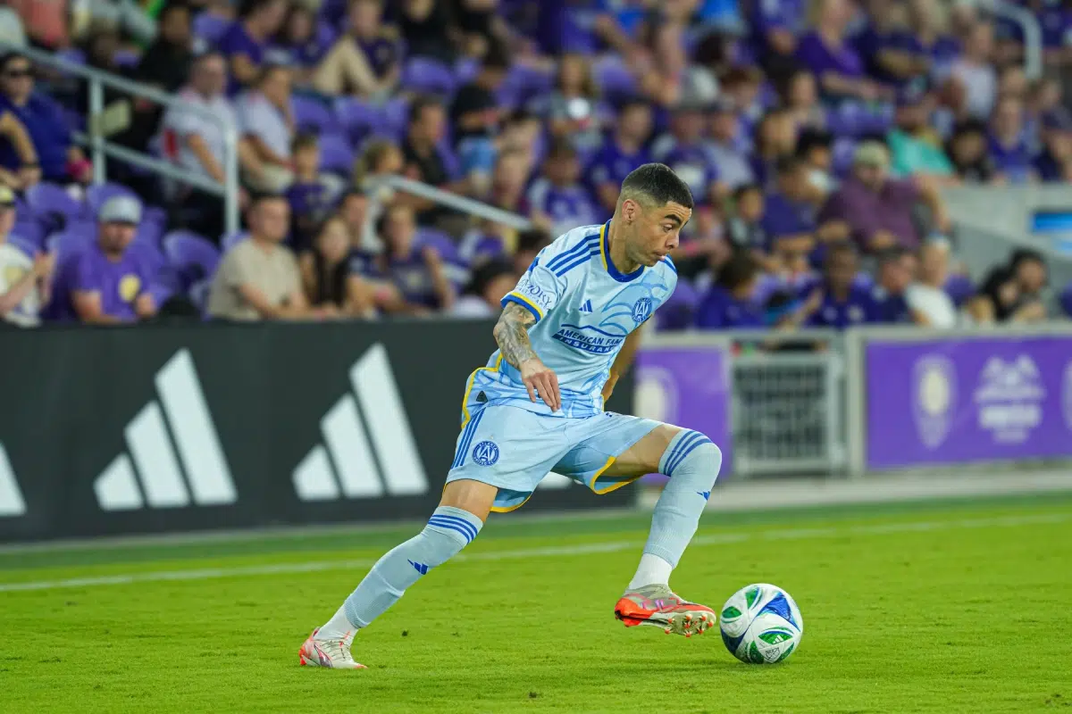 Miguel Almirón runs across the field at Inter&Co Stadium.