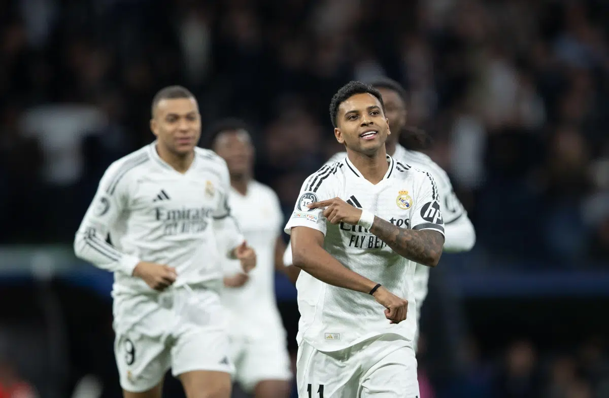Rodrygo celebrates Real Madrid's first goal in the first leg of the Champions League round of 16 between Real Madrid and Atlético de Madrid