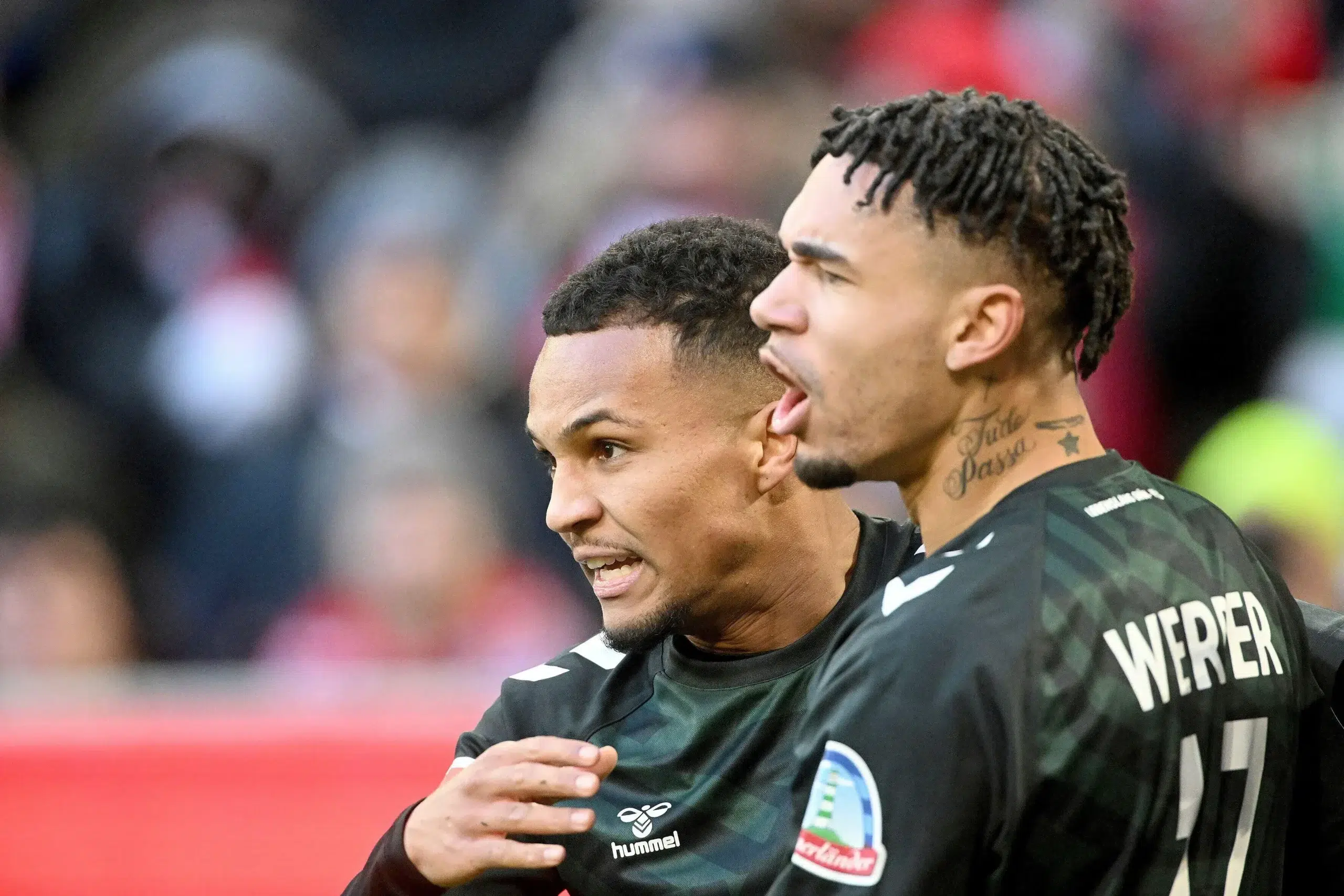 Justin Njinmah and Felix Agu playing for Werder Bremen