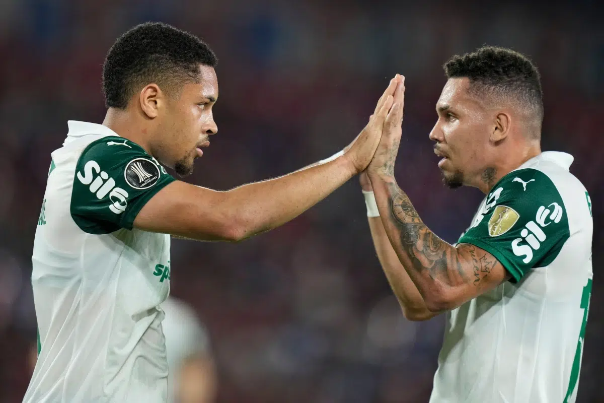 Vitor Roque of Brazil's Palmeiras celebrates with Paulinho after scoring their side's second goal during a Copa Libertadores Group G soccer match