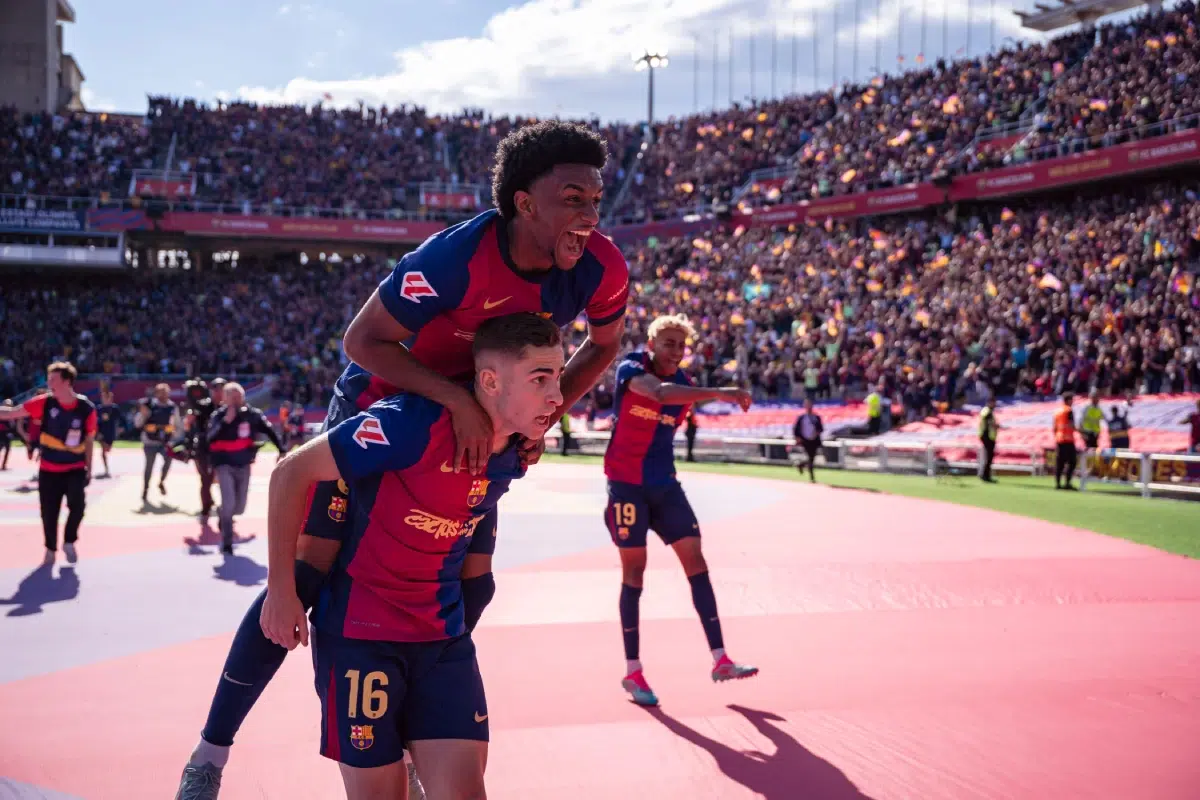 Fermin Lopez and Alejandro Balde of FC Barcelona celebrate a goal during the LaLiga football match between FC Barcelona and Real Madrid