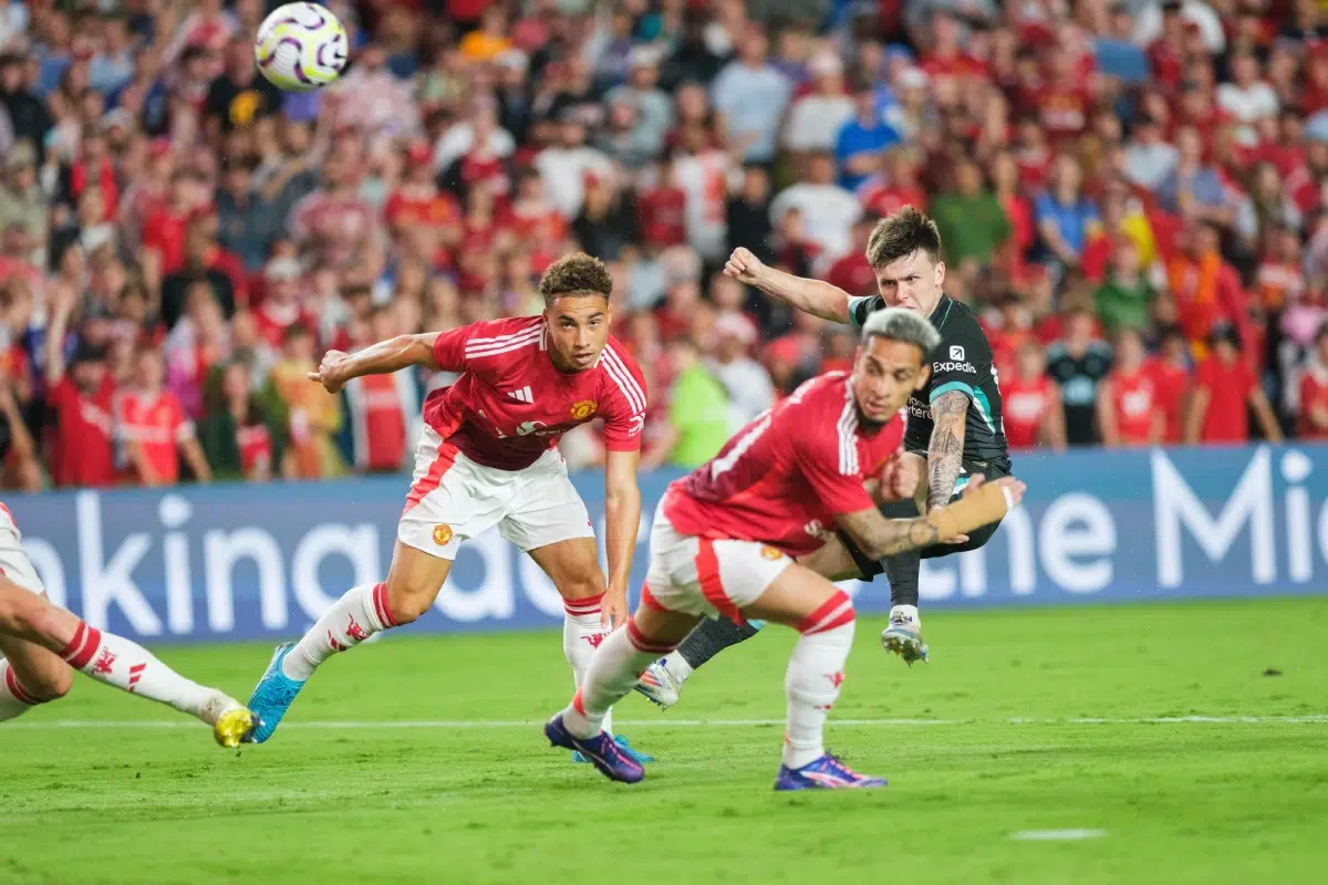 Liverpool midfielder Ben Doak takes a shot on goal against Manchester United, 2024