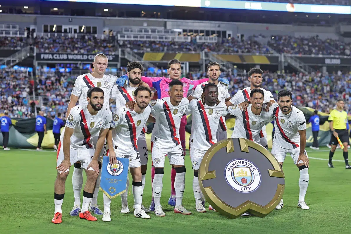 Manchester City squad poses for team photo with Erling Haaland, Josko Gvardiol, goalkeeper, Ederson, Ruben Dias, Matheus Nunes, Rayan Ait-Nouri, Bernardo Silva, Savinho, Jeremy Doku, Tijani Reijnders and Ilkay Guendogan