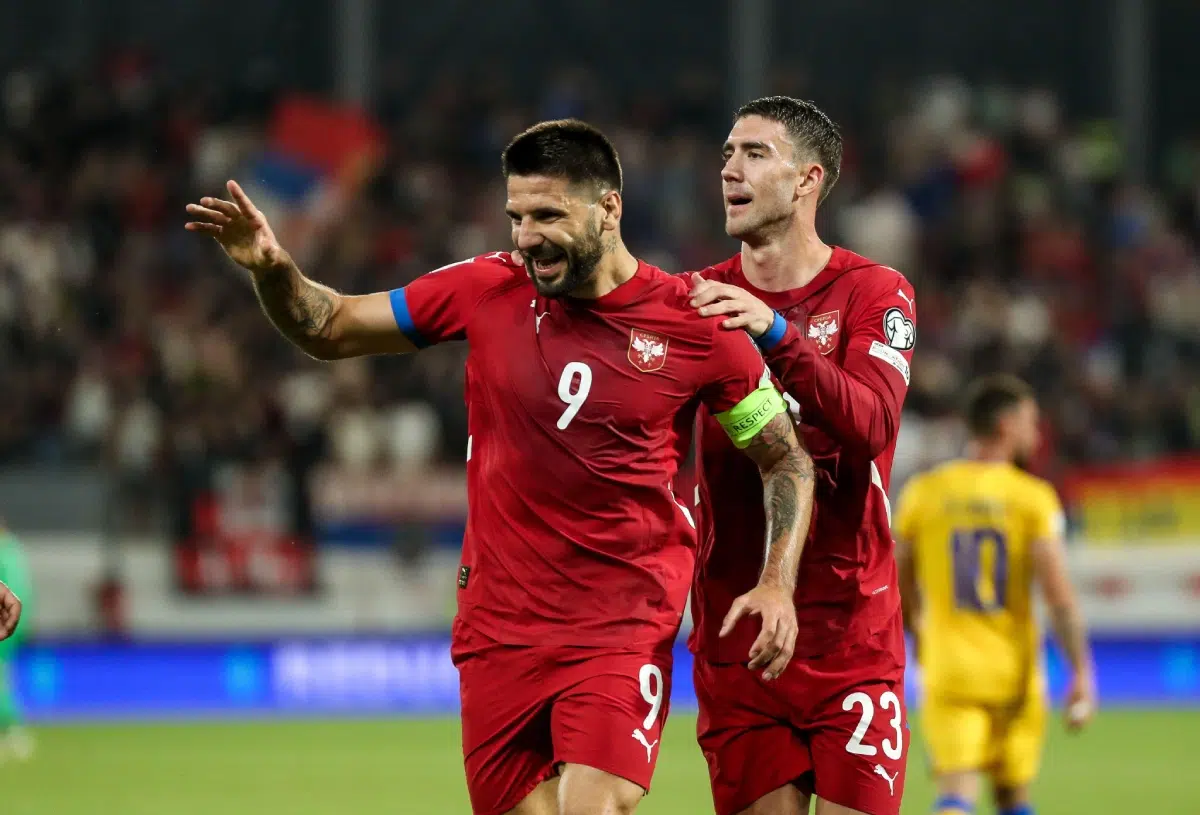 Aleksandar Mitrovic of Serbia (L) celebrates his second goal with teammate Dusan Vlahovic (R) during the FIFA 2026 World Cup European Qualifier
