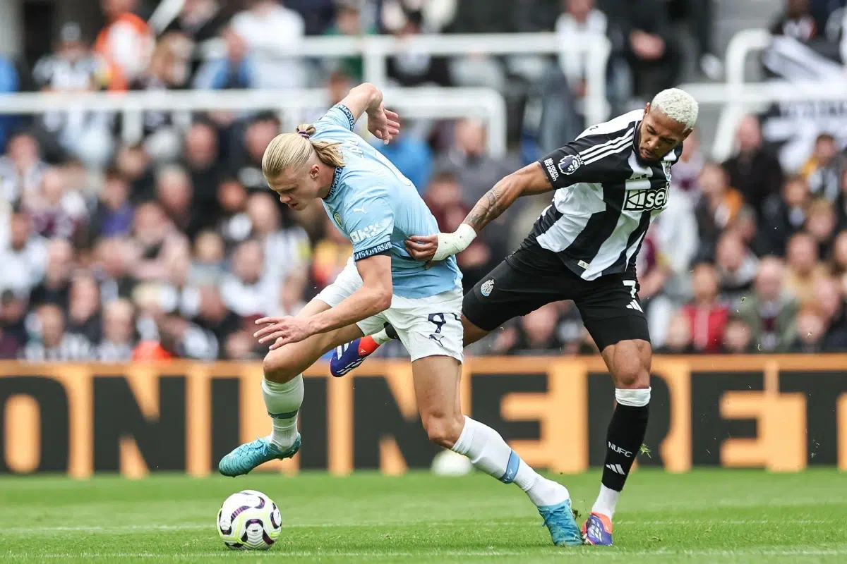 Erling Haaland of Manchester City is fouled by Joelinton of Newcastle United during the Premier League match