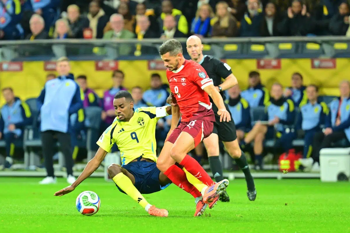 Remo Freuler (8 Switzerland) and Alexander Isak (9 Sweden) in a battle for the ball during the FIFA World Cup Qualifiers, 2025