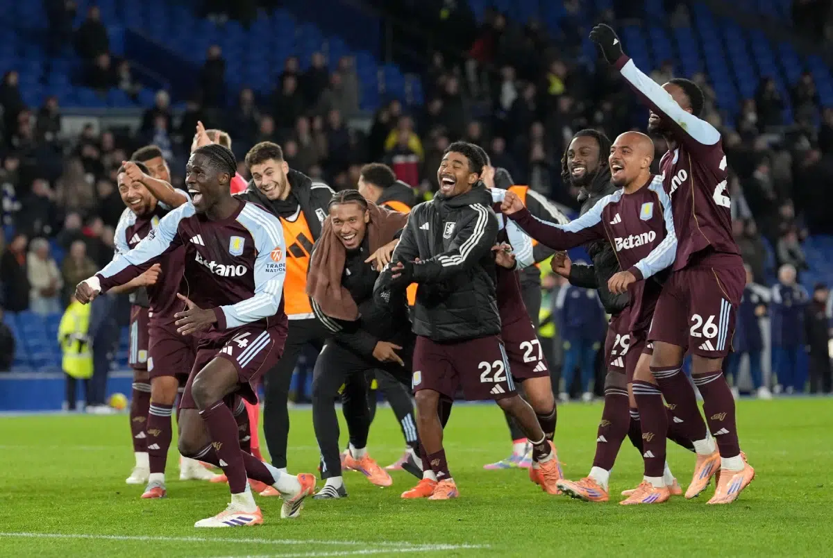 Aston Villa players celebrate following the Premier League match at the American Express Stadium, Brighton and Hove