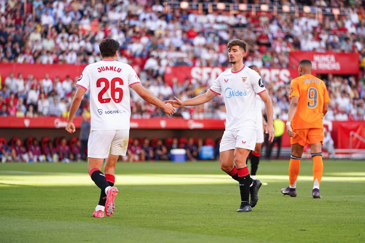 Juanlu Sanchez and Kike Salas (Sevilla FC) during LaLiga match vs Real Madrid, at Sanchez Pizjuan stadium on May 18, 2025 in Seville