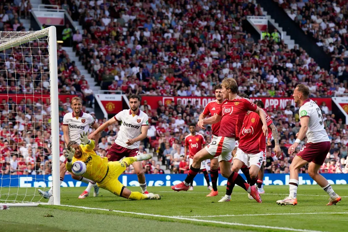 Alphonse Areola of West Ham United saves from Rasmus Højlund of Manchester United, 2025