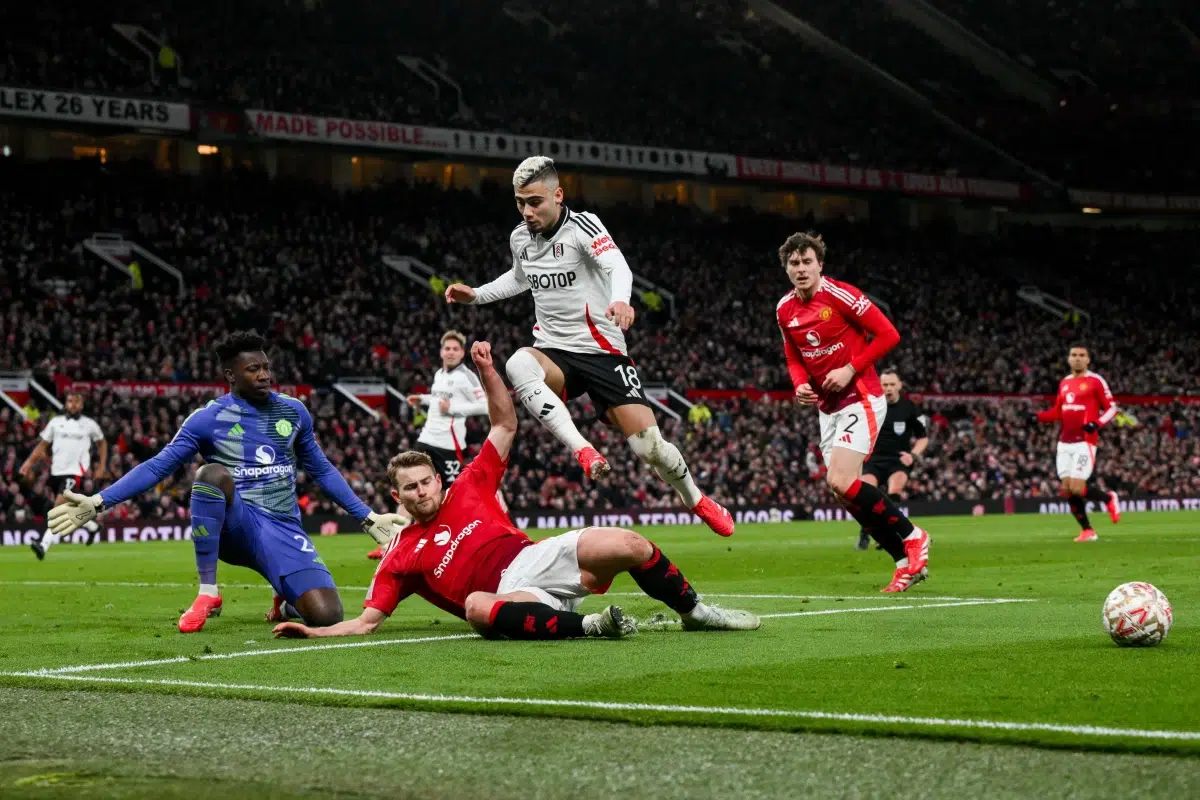 Andreas Pereira of Fulham is challenged by Matthijs de Ligt of Manchester United, 2025