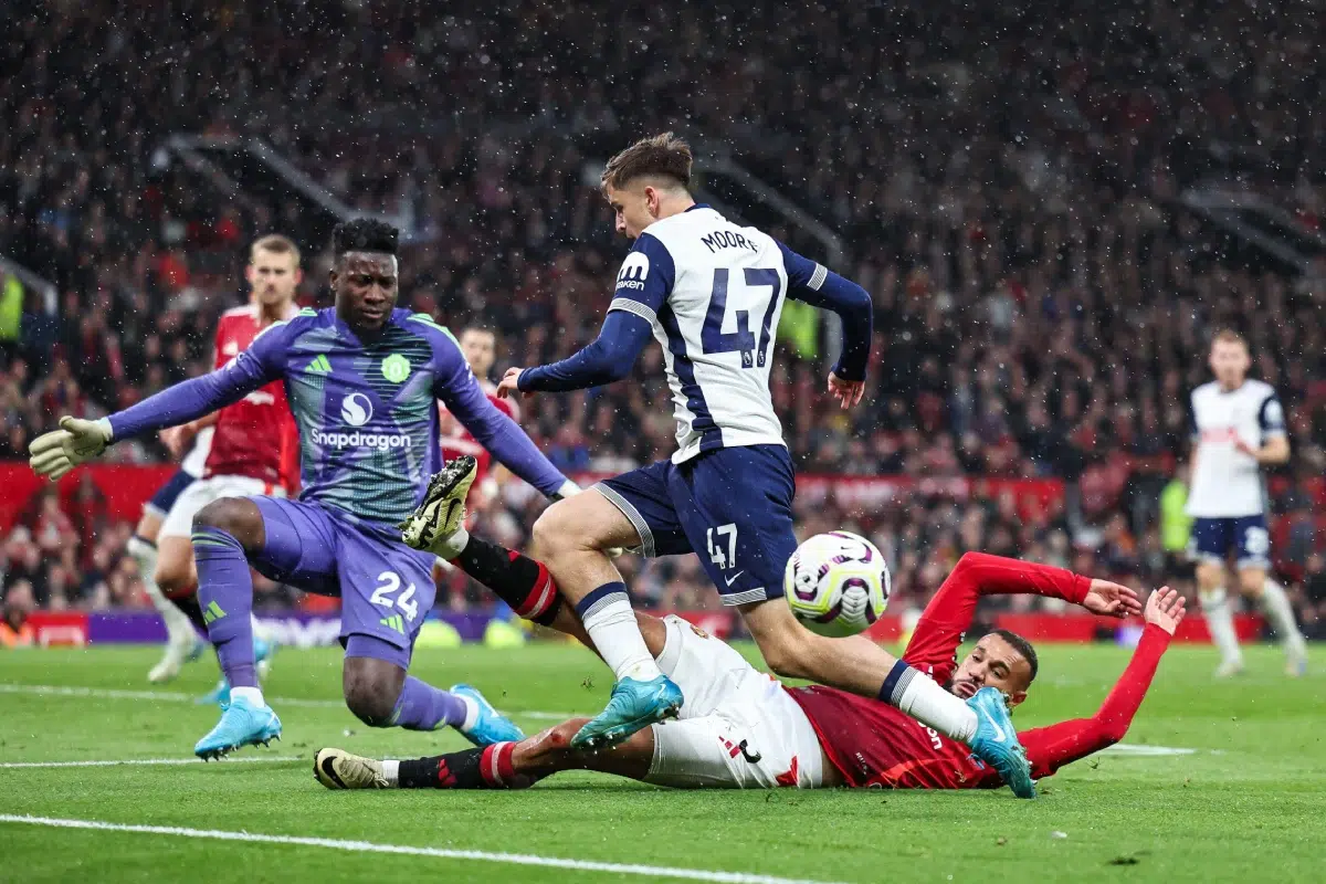 Mikey Moore of Tottenham Hotspur is tackled by Noussair Mazraoui of Manchester United during the Premier League match Manchester United vs Tottenham Hotspur, 29th September 2024.