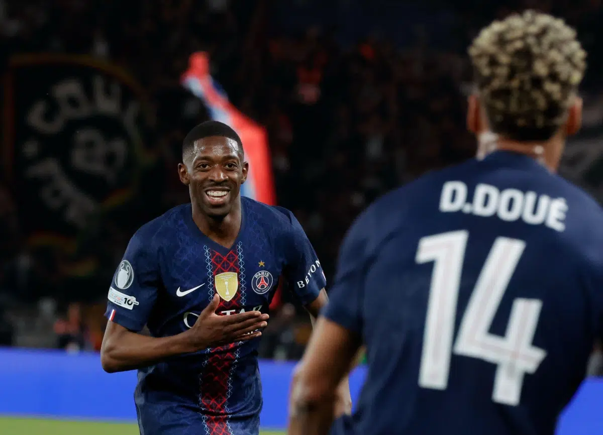 PSG's Ousmane Dembele celebrates with his teammate Desire Doue, 2026